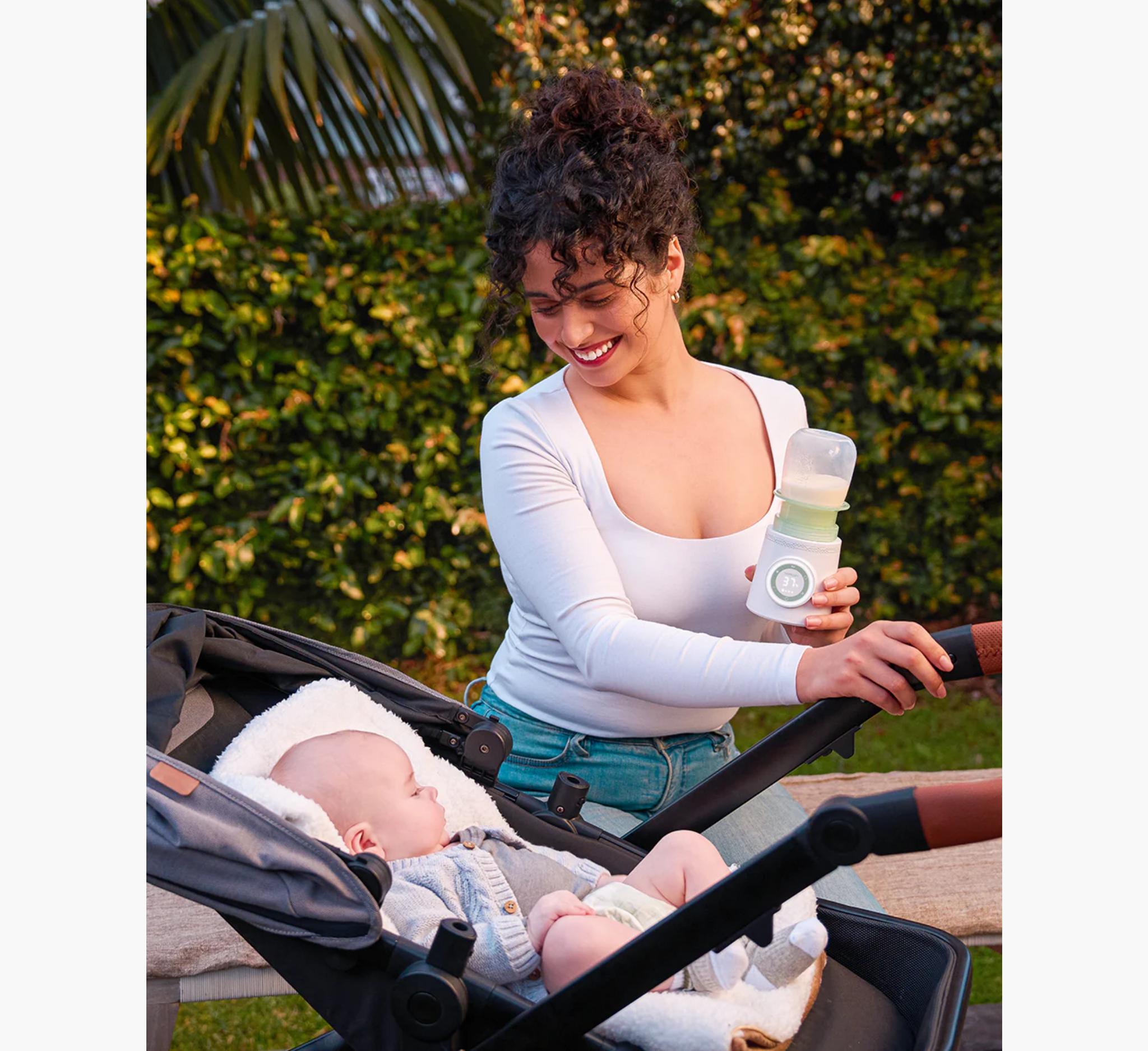 Ngrohës shishesh portativ pa tel Momcozy për udhëtim -MW03 