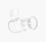 Pompë gjiri e veshur me një Momcozy S12 Pro 