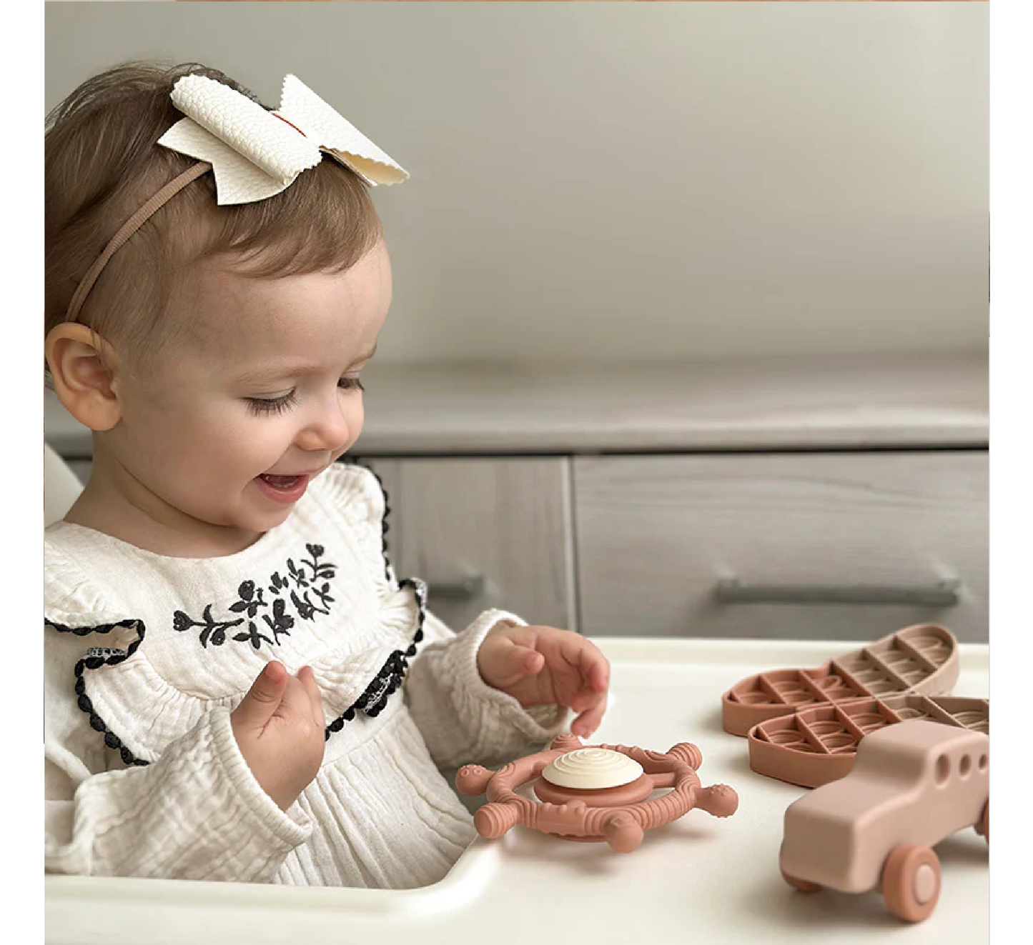 Lodër rrotulluese ndijore Moonkie për fëmijë 12 muaj+