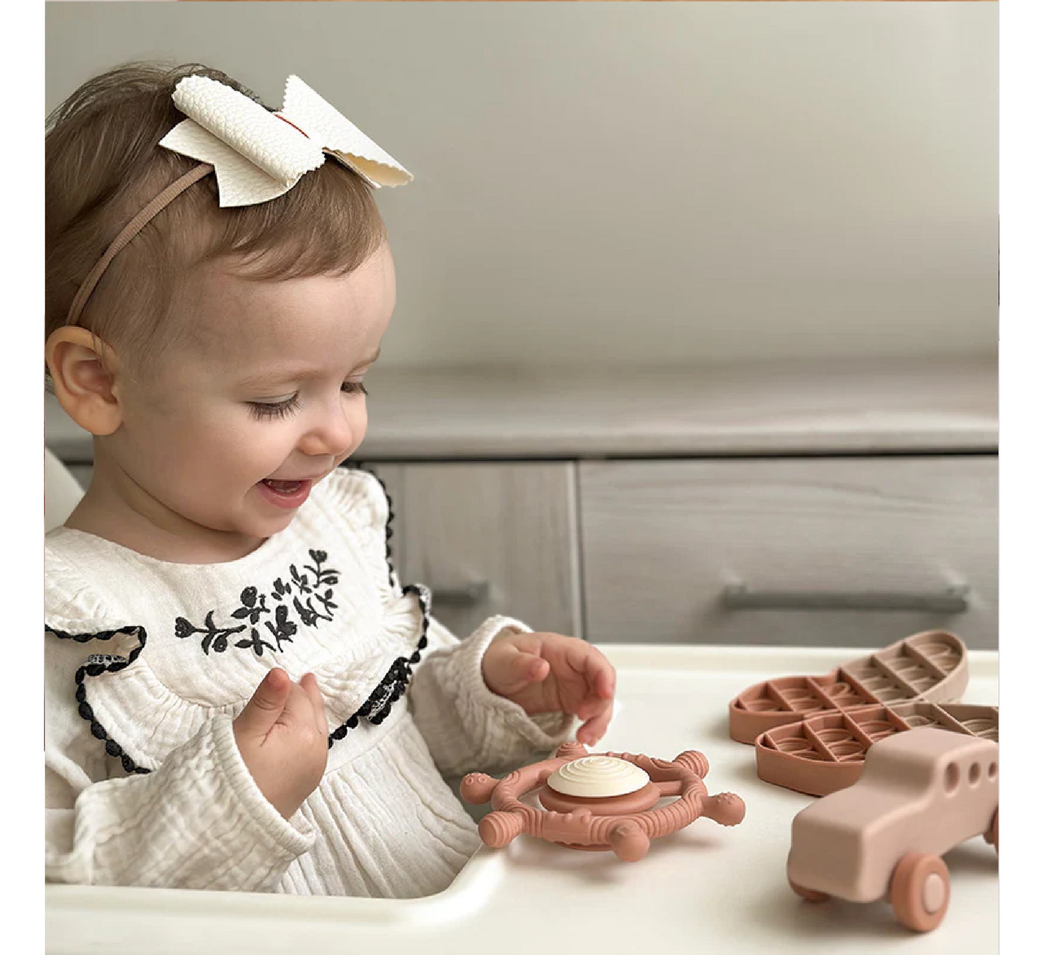 Lodër rrotulluese ndijore Moonkie për fëmijë 12 muaj+