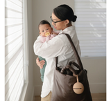 Mbajtëse biberoni prej silikoni për fëmijë Mushie